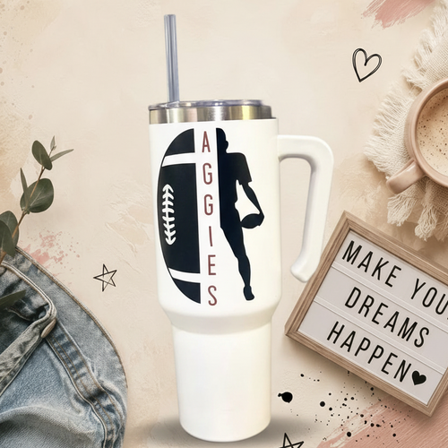 Aggies tumbler view one on the cream branded background