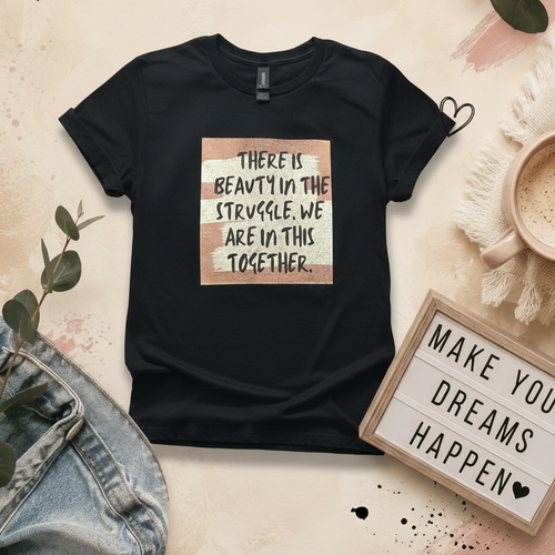 Black There Is Beauty in the Struggle Tee displayed on an Anais Dream Creation branded background